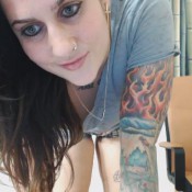 strip tease goddess green eyed takes it all off