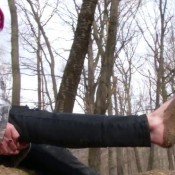 lesbian slave is sucking on muddy toes.